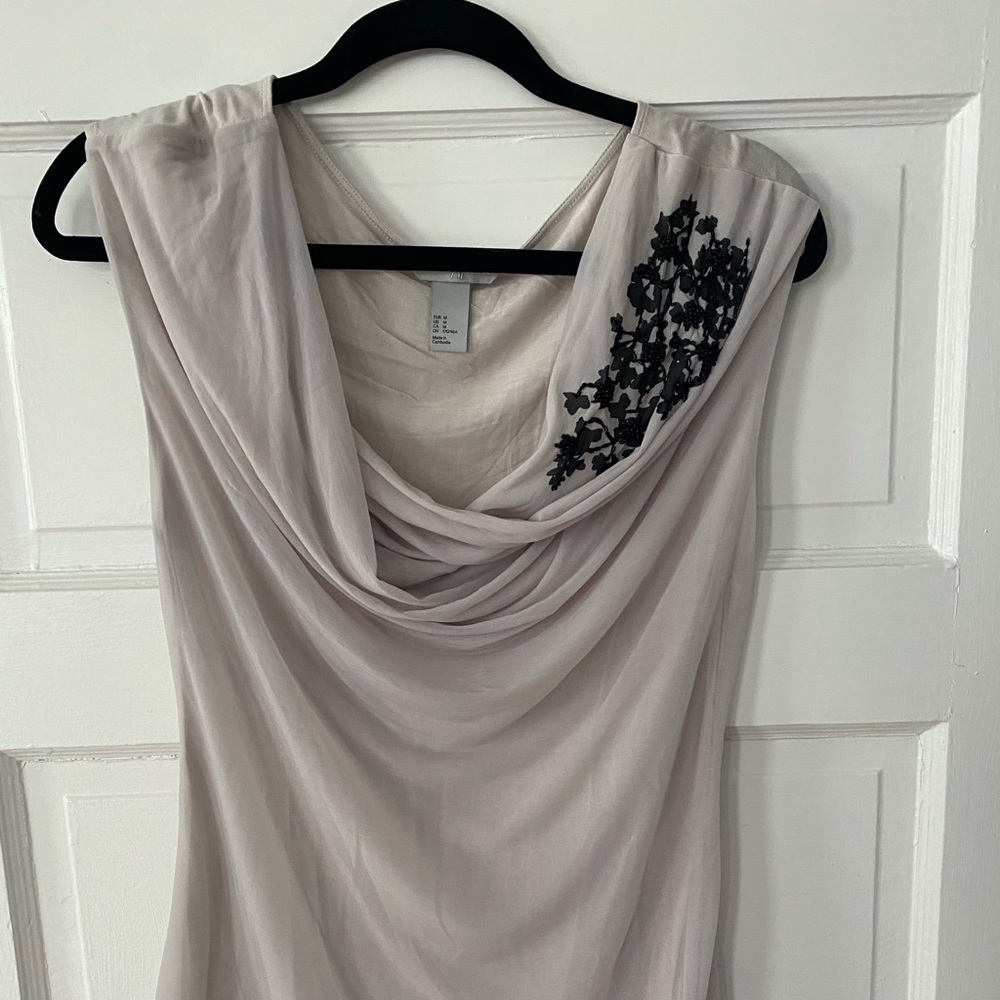 H&M grey cotton top with black beaded detail. Cotton material with mesh overlay
